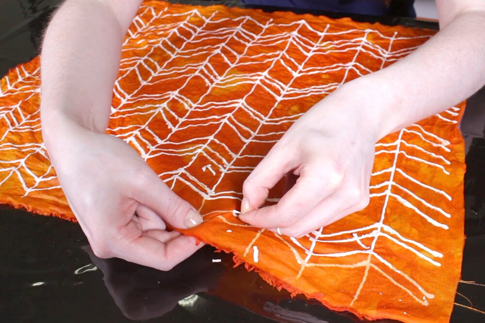 How To Dye Fabric: No Wax Batik Technique - Rinse and remove the glue