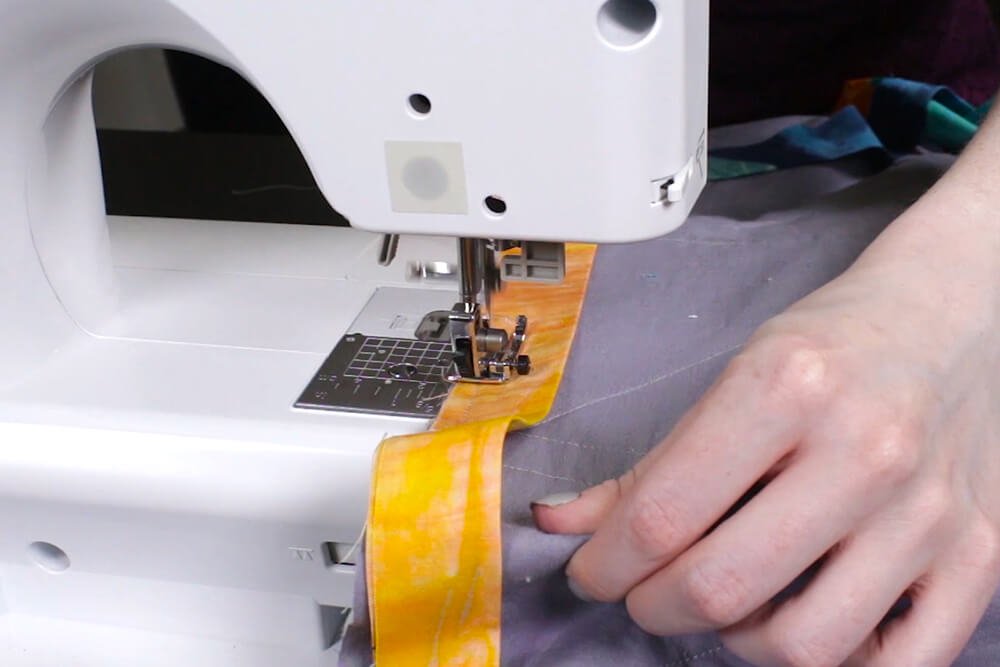 How to Make a Herringbone Quilt - Sew binding