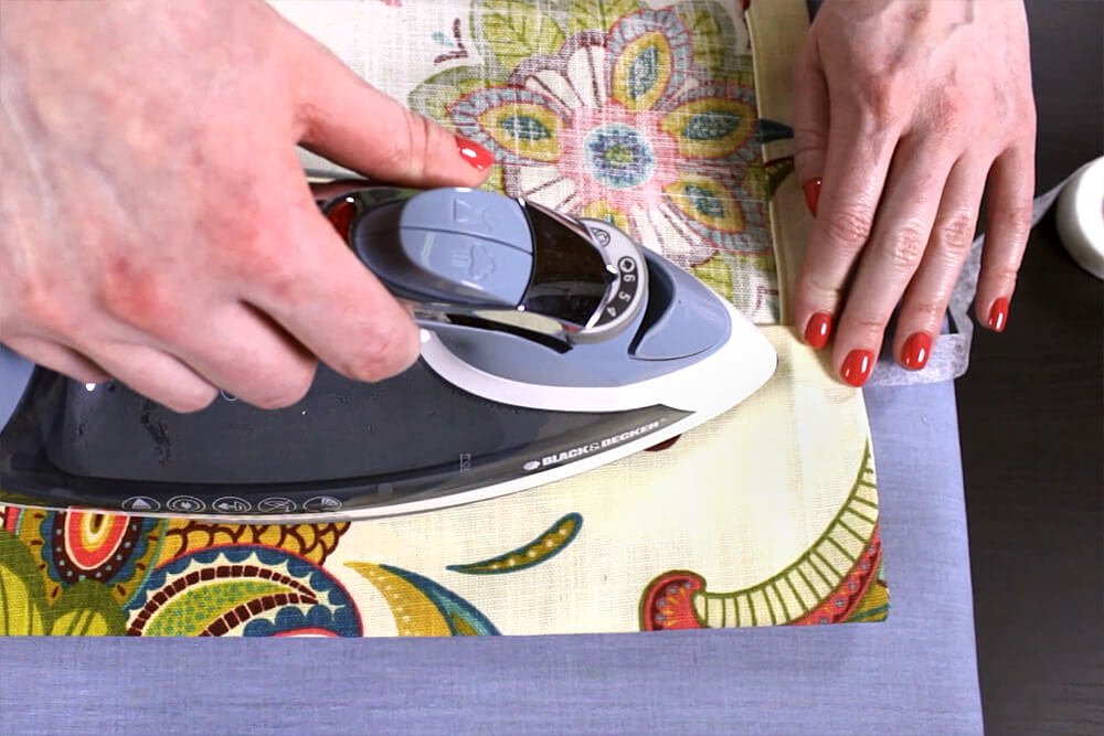 No Sew Grommet Curtains Tutorial - Step 2: Hem the edges of the panel