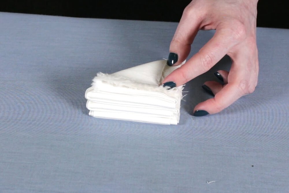 How to Dye Fabric - Shibori Folding Technique - Folding the fabric