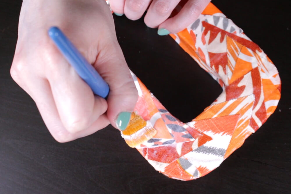 How to Decoupage with Fabric - Glue on the fabric