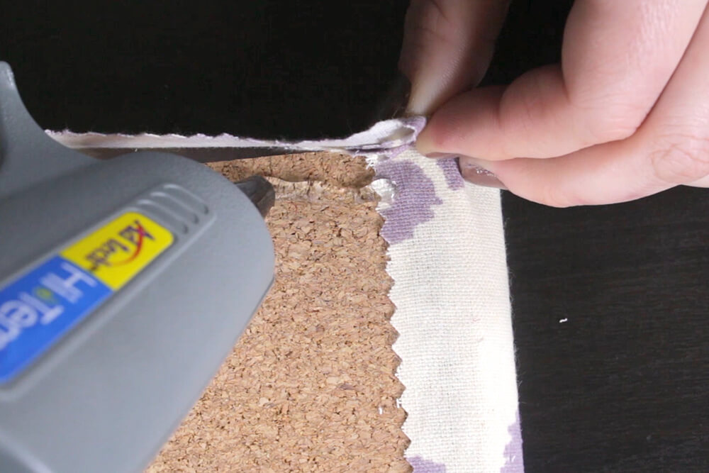 how to make a fabric cork board-Glue the fabric