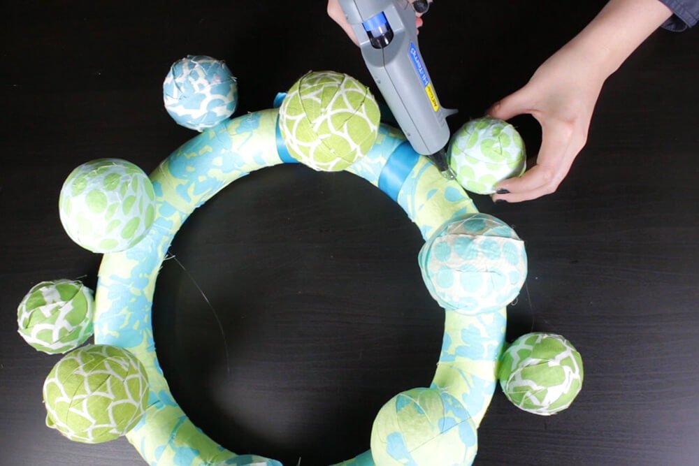 fabric ball wreath step-5- Glue the Styrofoam balls to the wreath