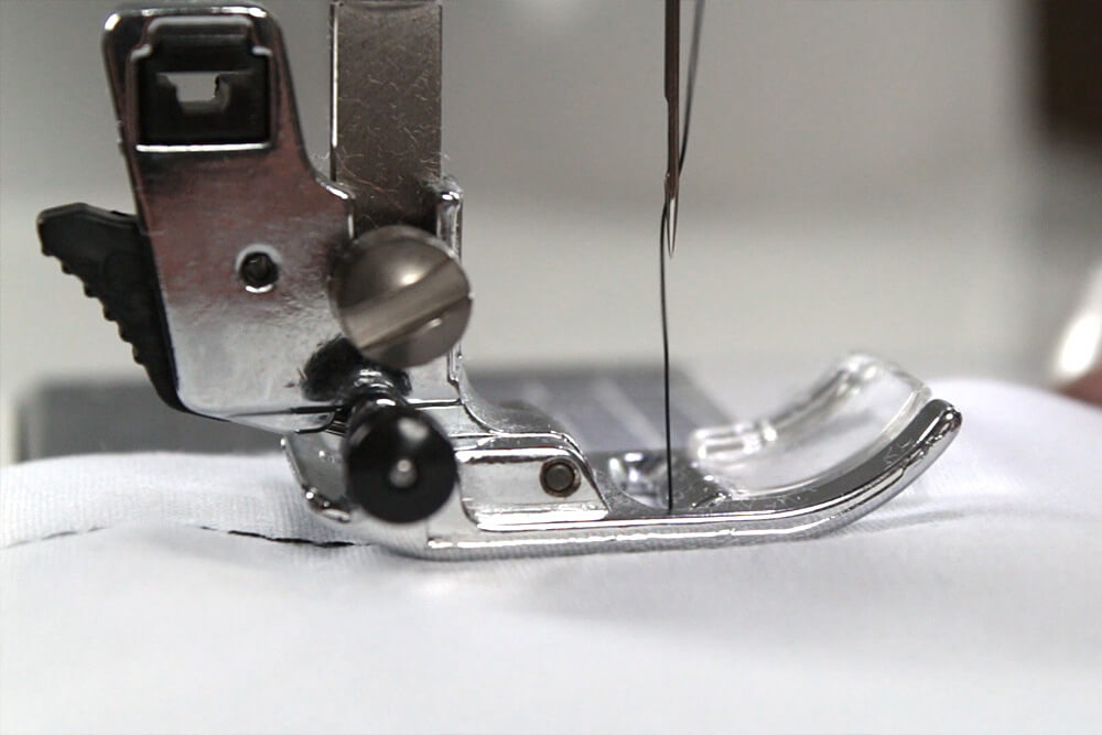 Sewing Machine Basics - Press foot pedal to sew forward