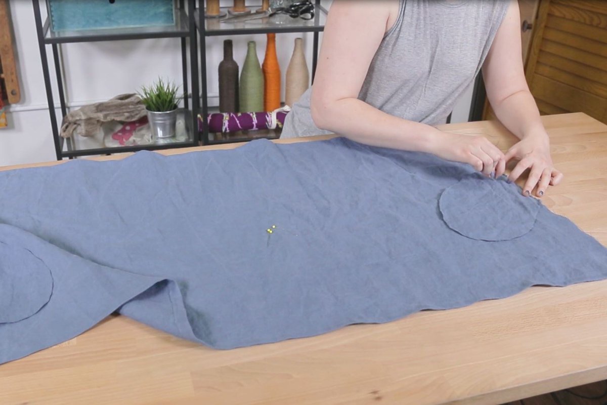 Place and sew pockets to the skirt
